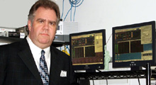 Bob Perry, JACK-FM founder, with servers running Ots software to power the station